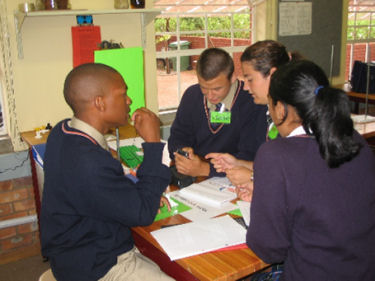 School children sending SMS