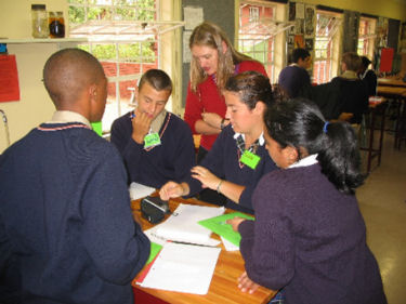 School children listening to reply